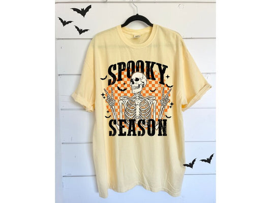 Spooky Season Skeleton and Trendy Skull Halloween Graphic Tee - Oversized Top